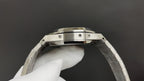Audemars Piguet watch case profile with metal bezel and crown guards.