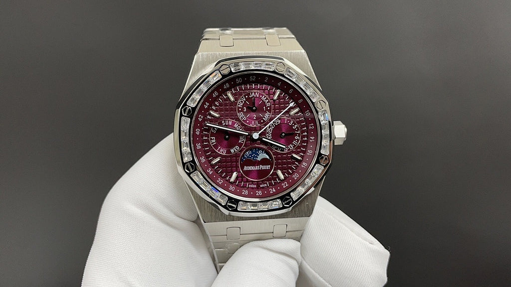Stainless steel wristwatch with burgundy dial and metal bracelet, round case