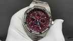 Stainless steel wristwatch with burgundy dial, chronograph subdials and metal bracelet