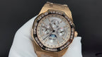 Gold-tone Audemars Piguet watch with chronograph-style silver dial