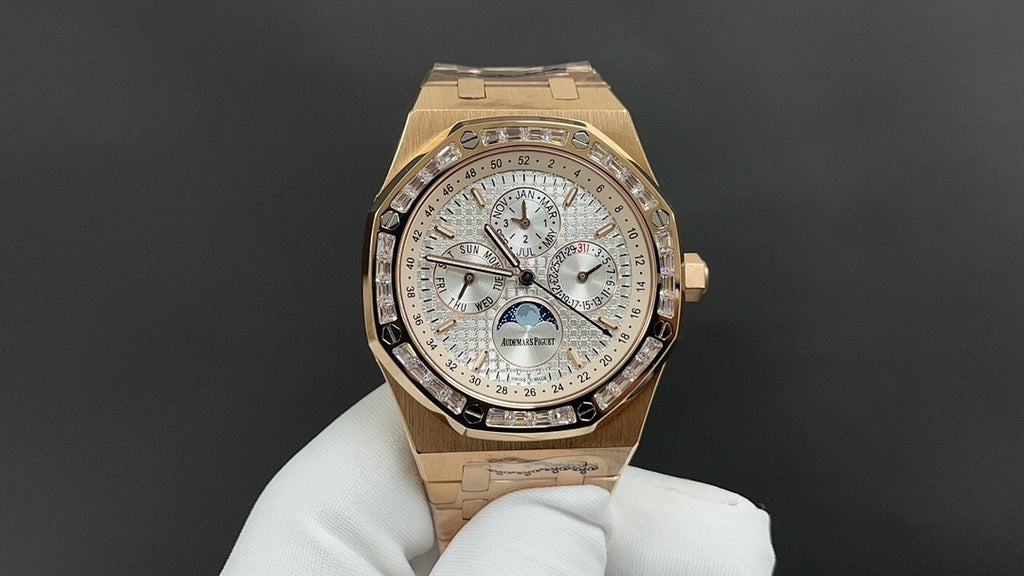 Gold-tone Audemars Piguet watch front view with silver dial