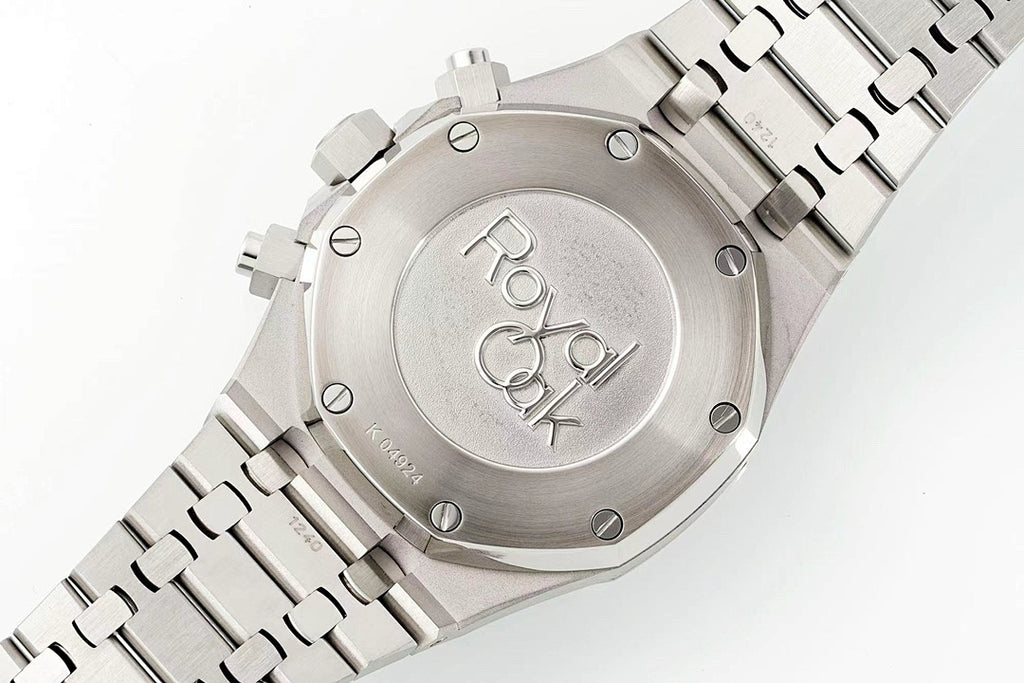 Audemars Piguet stainless steel watch case back with engraved logo and screws
