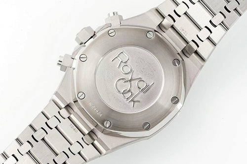 Audemars Piguet stainless steel watch case back with engraved logo and screws