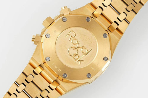 Gold-tone watch caseback with AP engraving and multiple screw heads