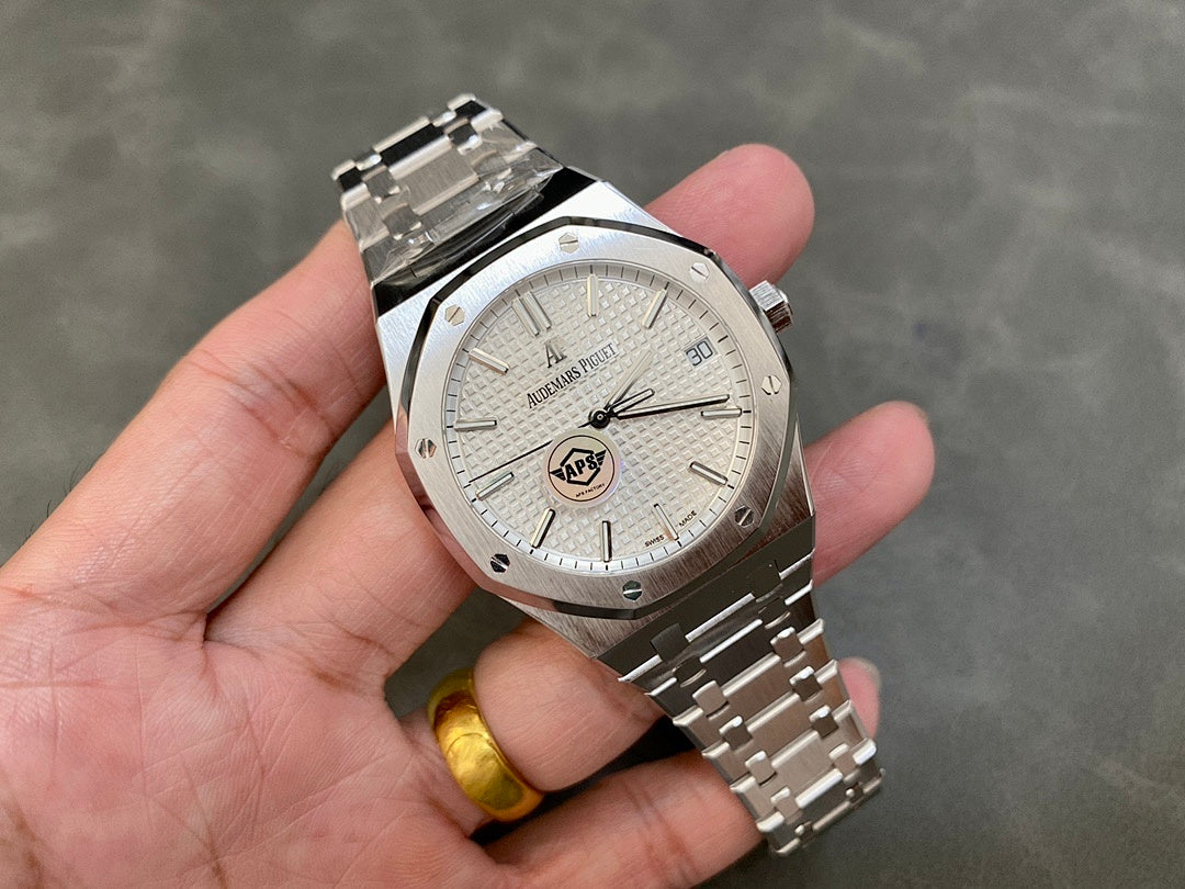 Stainless steel wristwatch with silver dial, date marker at 30, and link bracelet
