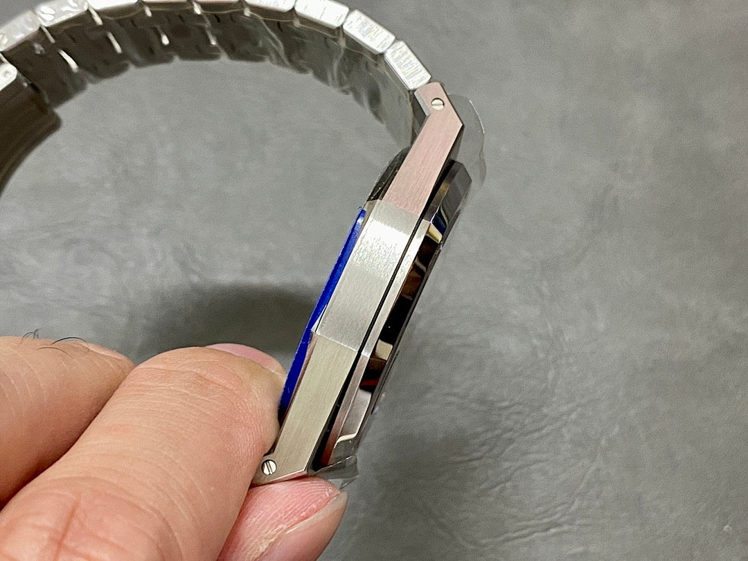 Audemars Piguet steel watch case with blue film on bezel and side crown