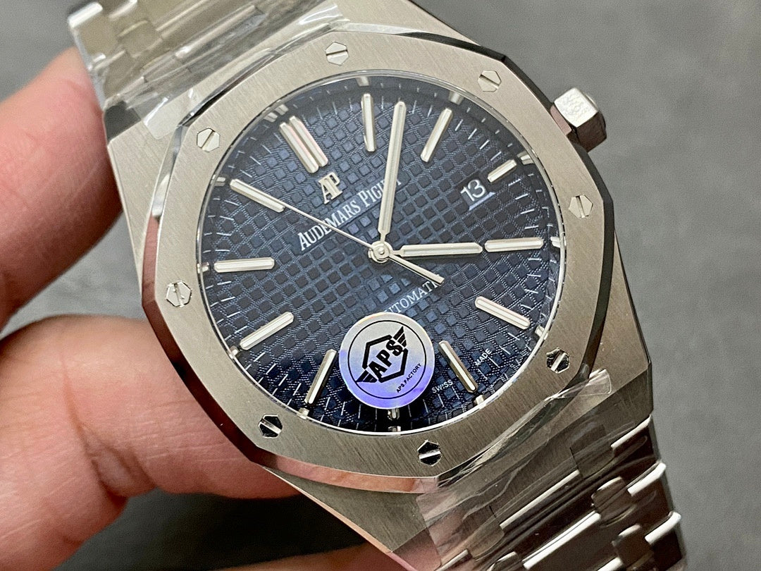 Audemars Piguet steel watch with blue textured dial, three hands, date window at 3