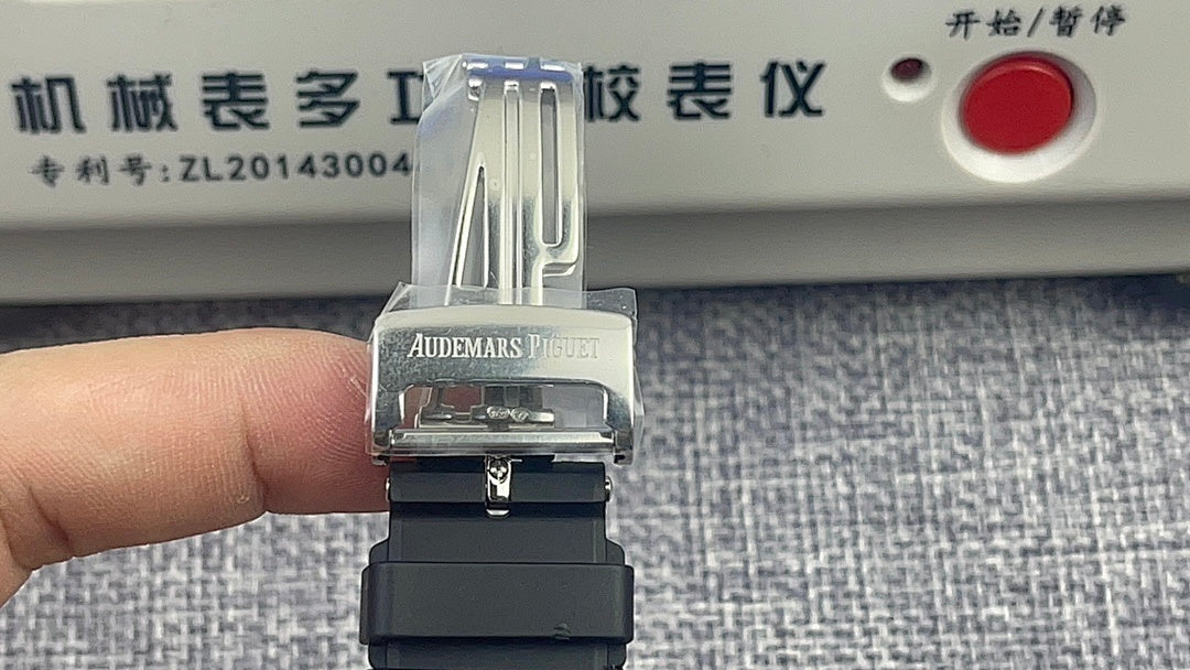 Audemars Piguet watch clasp view with black strap and stainless steel buckle