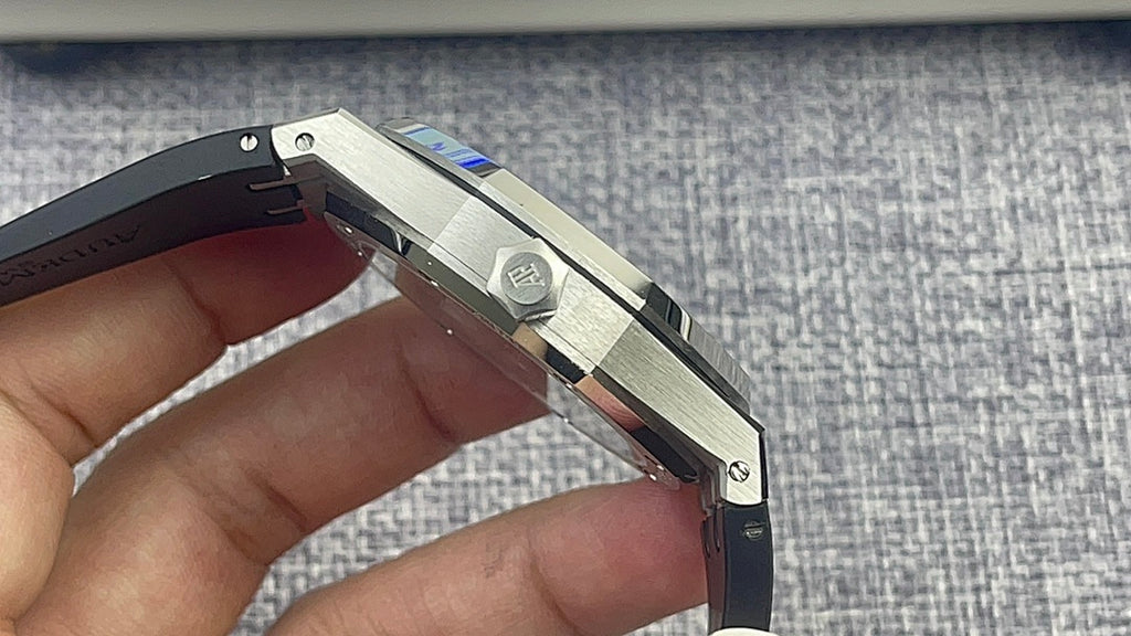 Audemars Piguet watch underside with black rubber strap and metal lugs