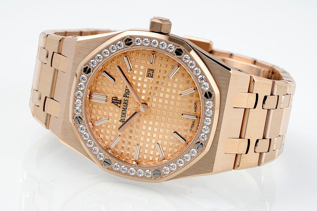 Audemars Piguet watch with rose gold bracelet, gem bezel, and champagne dial close-up