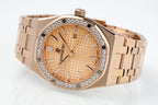 Audemars Piguet watch with rose gold bracelet, gem bezel, and champagne dial close-up