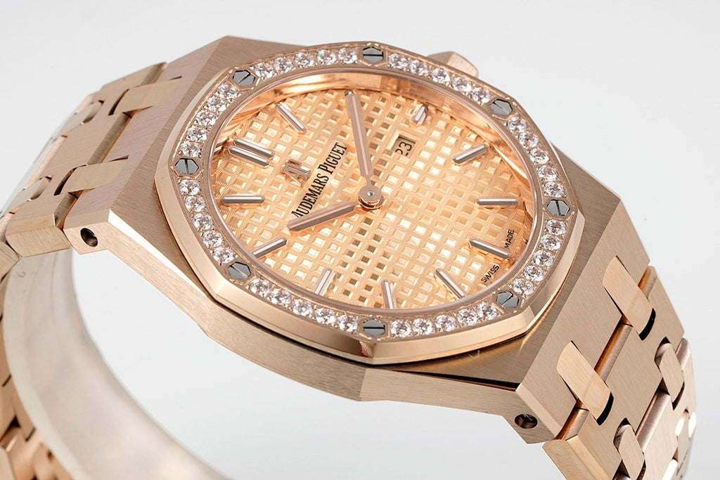 Audemars Piguet watch dial close-up with gem bezel and rose gold hands