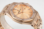 Audemars Piguet watch dial close-up with gem bezel and rose gold hands
