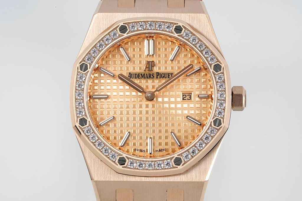 Audemars Piguet watch face close-up with rose gold case and gem bezel
