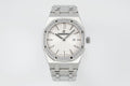 Audemars Piguet wristwatch with silver bracelet, diamond bezel, white dial and date window