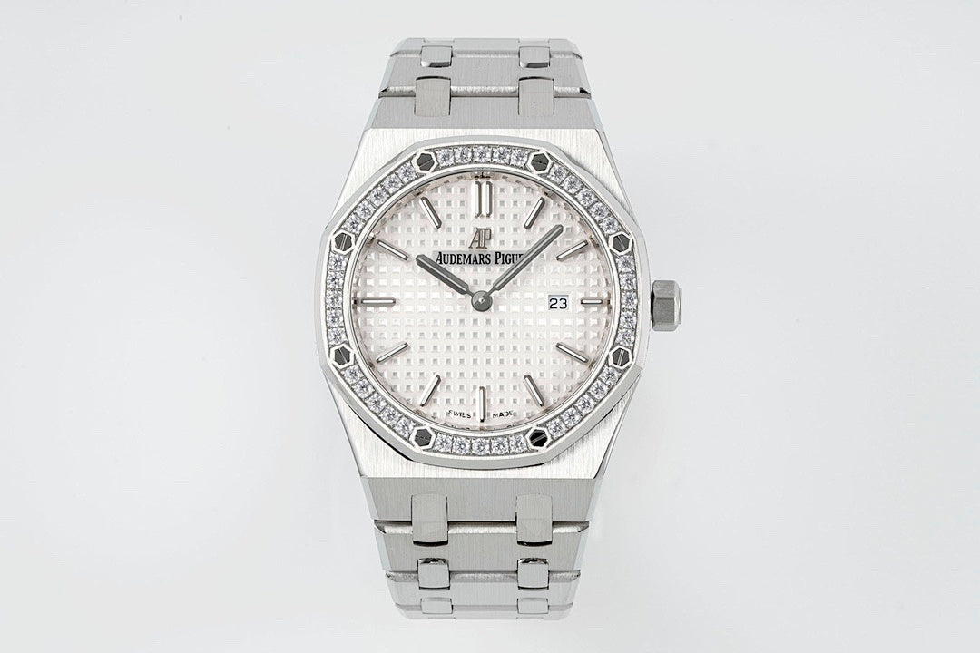Audemars Piguet wristwatch with silver bracelet, diamond bezel, white dial and date window
