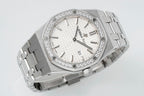 Audemars Piguet wristwatch with diamond bezel, white dial, and polished steel bracelet