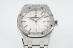 Audemars Piguet wristwatch with diamond bezel, white dial, and date shown at 23