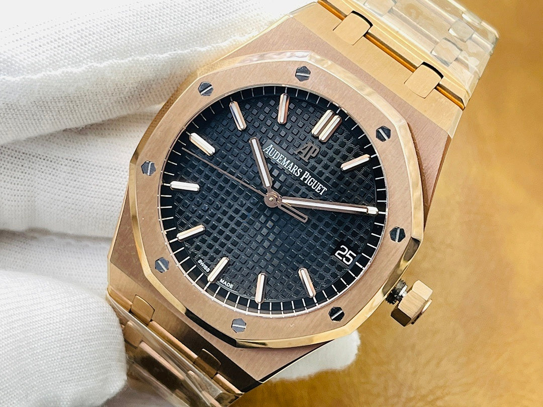 Audemars Piguet watch with black dial, gold-tone octagonal bezel and date window at 25.