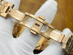 Gold-tone metal bracelet and case back detail of a luxury wristwatch