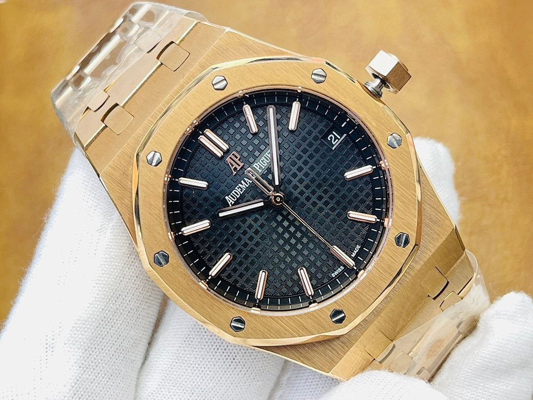 Gold-tone luxury wristwatch with dark blue dial, baton markers, and crown at top