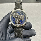 Audemars Piguet round watch with black textured fabric strap and blue dial accents