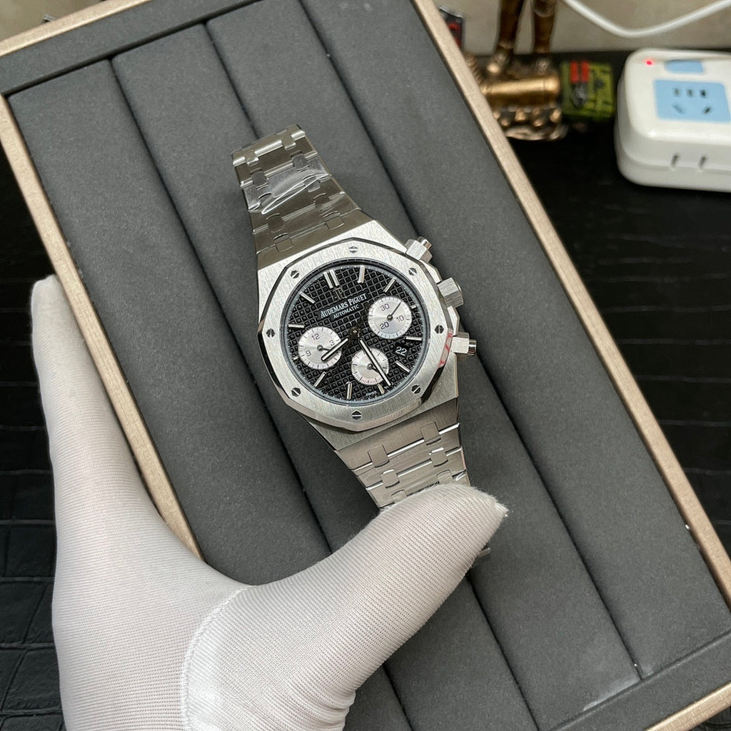 Audemars Piguet chronograph watch with black patterned dial and steel bracelet, side view