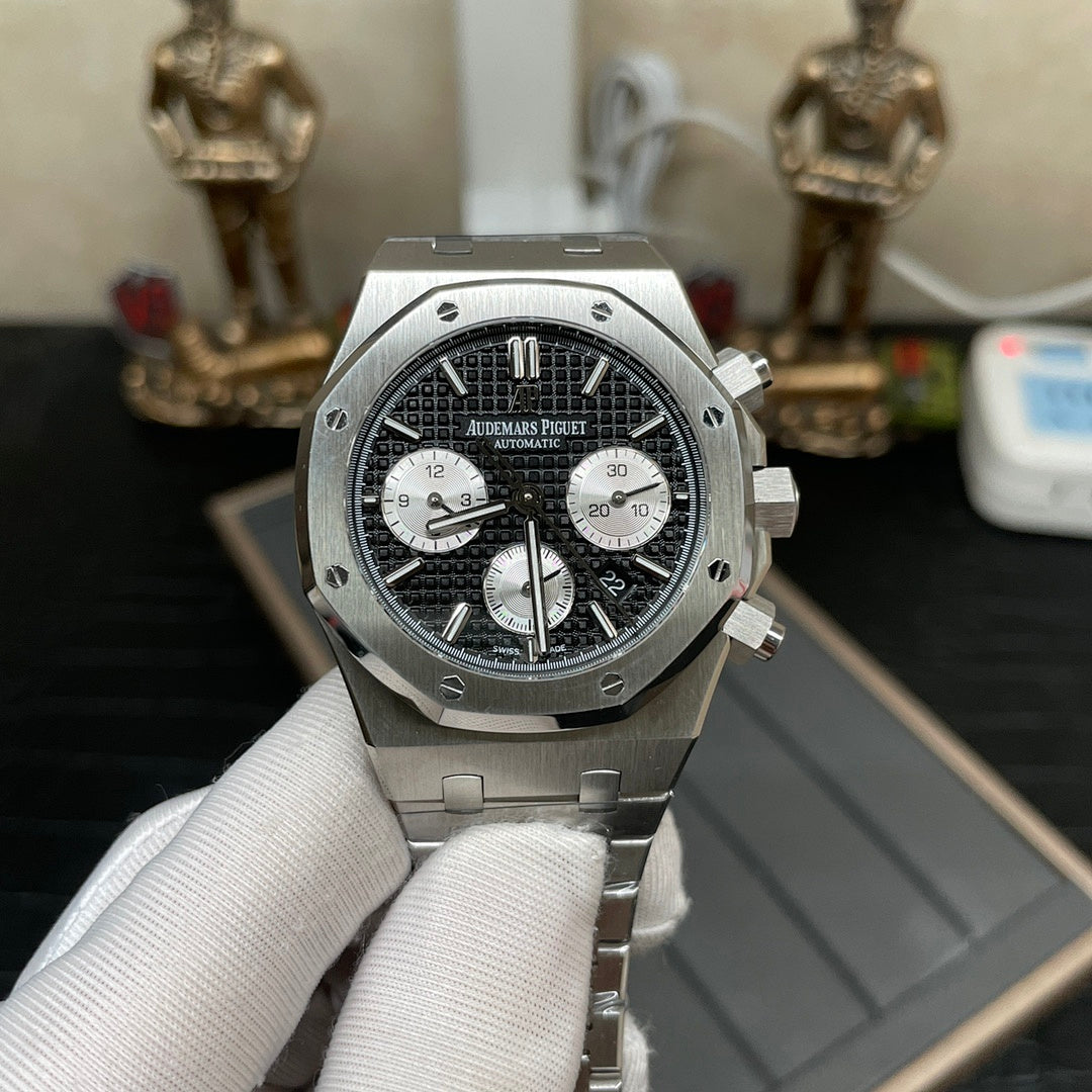 Audemars Piguet chronograph watch with black dial, white subdials, and steel bracelet, front