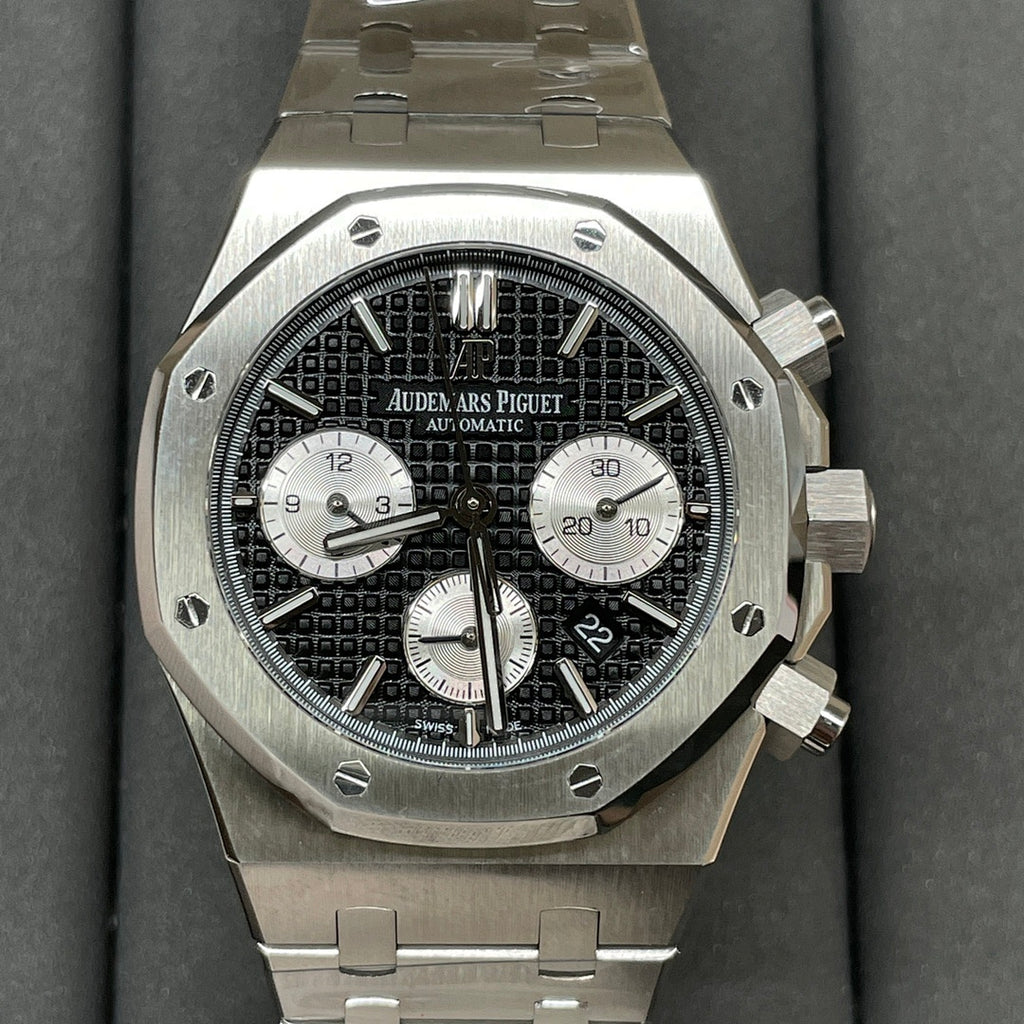 Audemars Piguet chronograph watch with black patterned dial and steel bracelet, front view