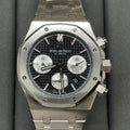 Audemars Piguet chronograph watch with black patterned dial and steel bracelet, front view