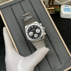 Audemars Piguet chronograph watch with black patterned dial and steel bracelet, in box