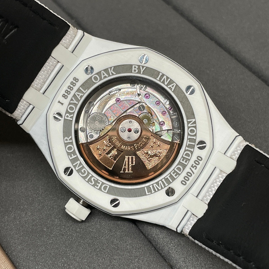 Audemars Piguet Royal Oak watch case back with exposed movement and white strap