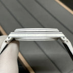 Audemars Piguet Royal Oak watch top view with white strap and metal case