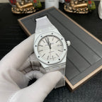 Audemars Piguet Royal Oak watch on display with silver dial and white strap
