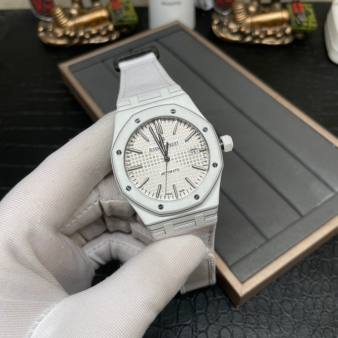 Audemars Piguet Royal Oak watch on display with silver dial and white strap