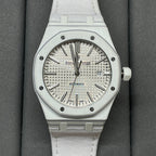 Audemars Piguet Royal Oak watch with silver dial and white rubber strap