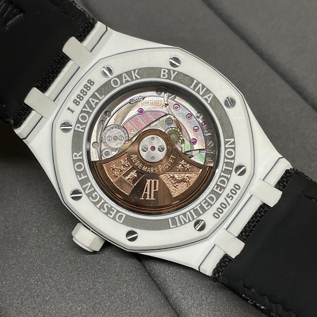 Audemars Piguet wristwatch caseback with gold-toned movement and exhibition window