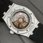 Audemars Piguet wristwatch caseback with gold-toned movement and exhibition window