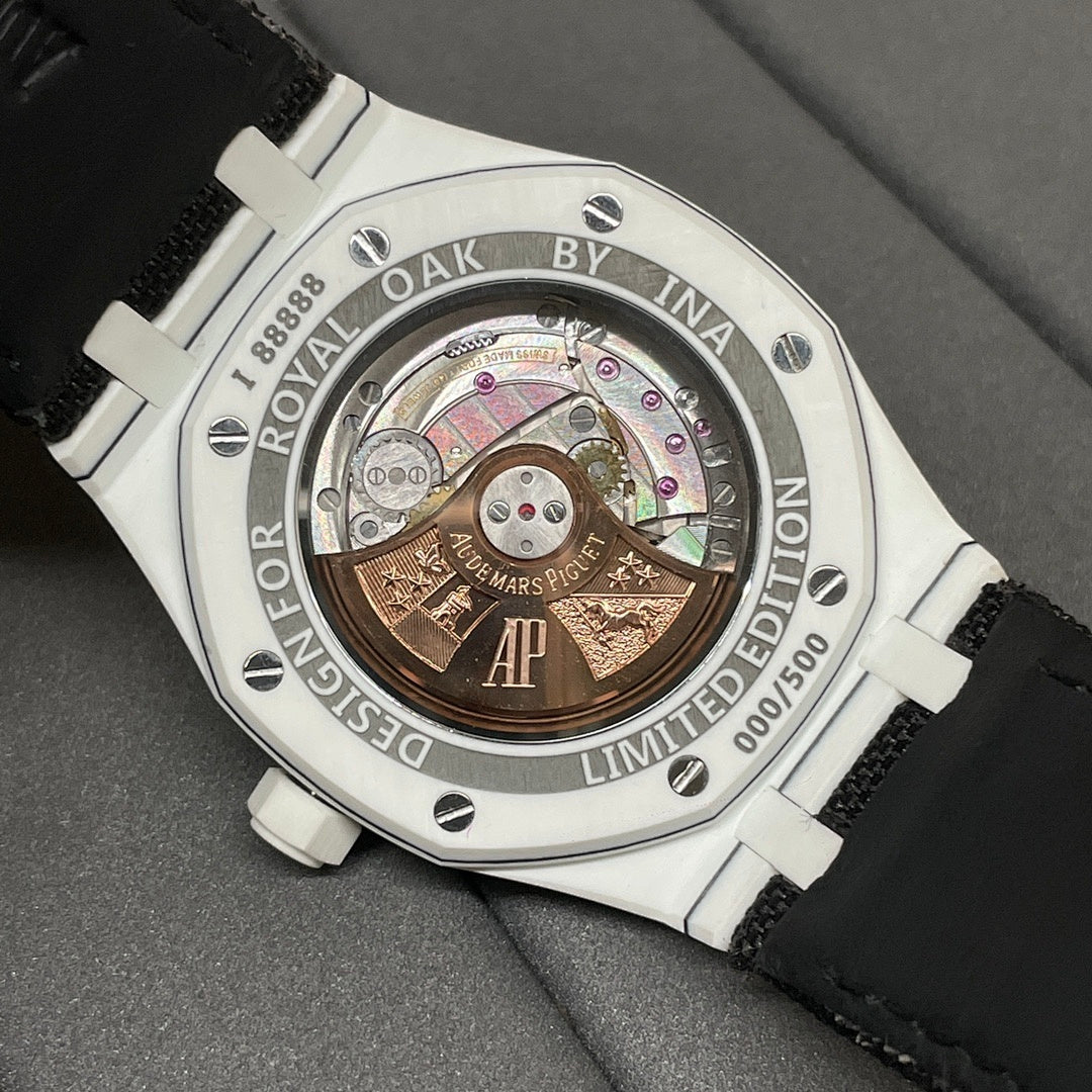 Audemars Piguet wristwatch caseback with gold-toned movement and exhibition window