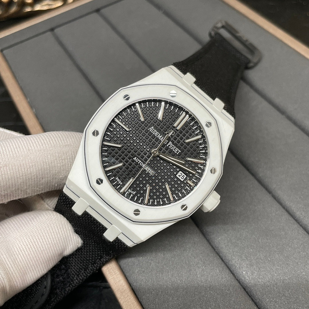 Audemars Piguet wristwatch with black dial, steel case, and black fabric strap