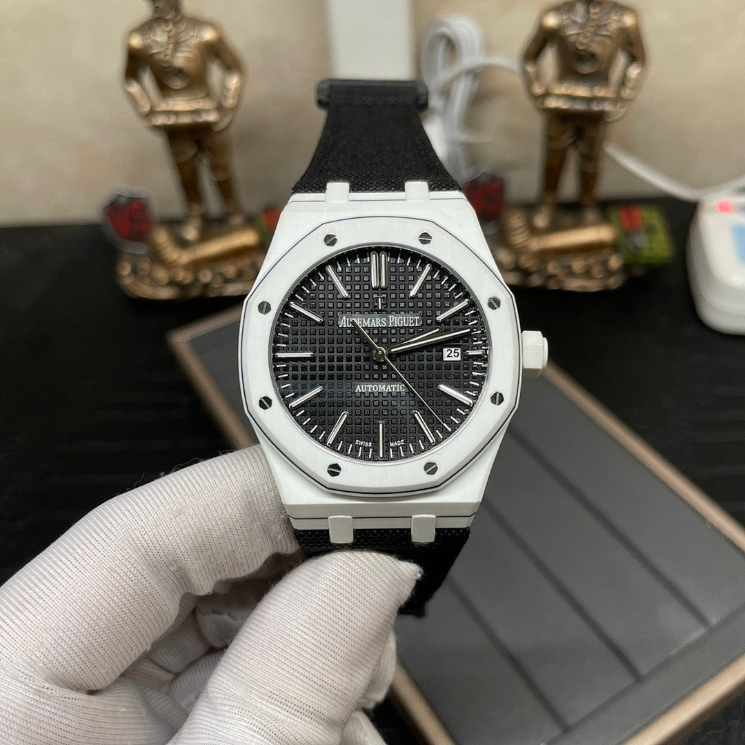 Audemars Piguet wristwatch with black textured dial, steel bezel, and black fabric strap