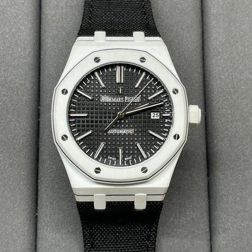 Audemars Piguet wristwatch with black textured dial, steel bezel, black fabric strap