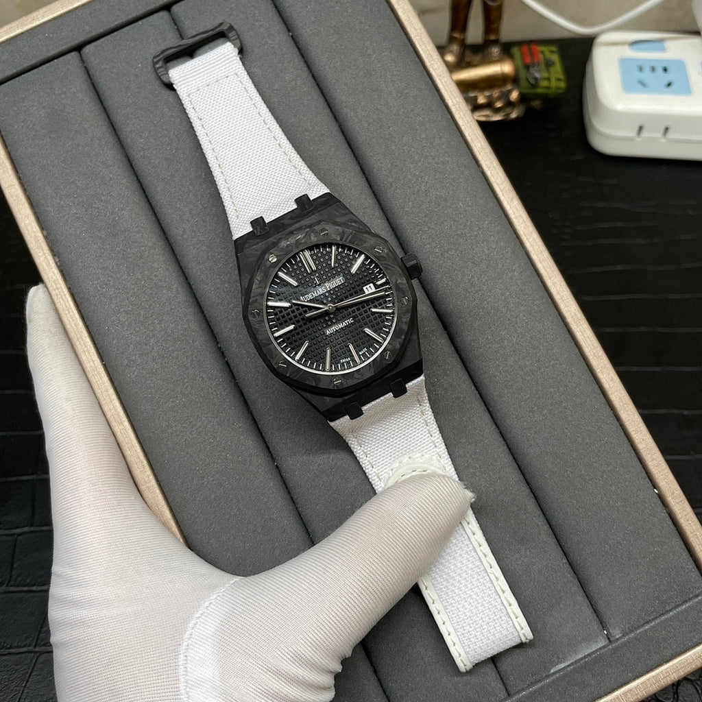 Audemars Piguet automatic watch in open gray case, white strap and black dial