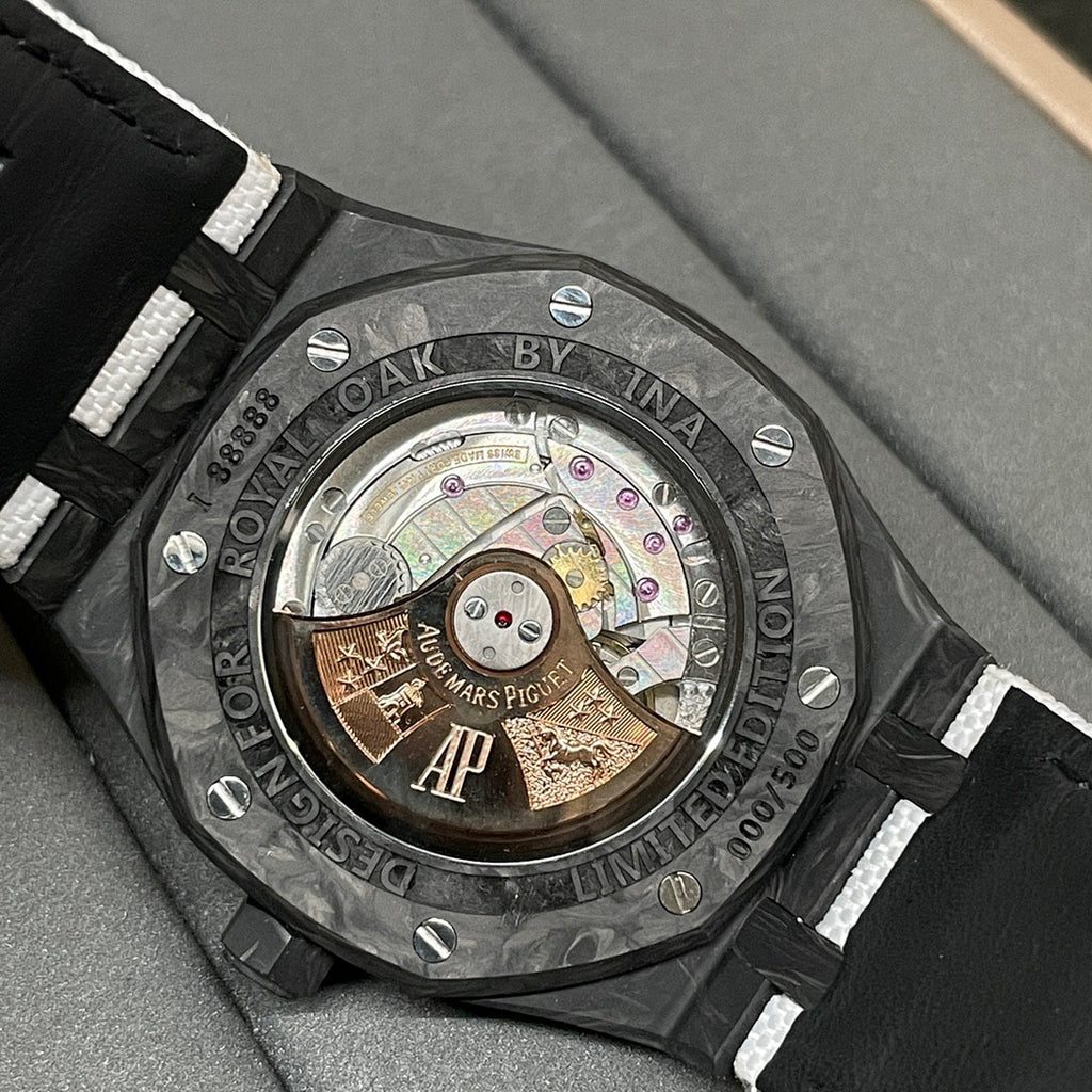 Audemars Piguet caseback watch with visible movement and engraved rotor