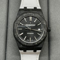 Audemars Piguet automatic watch with black textured dial and white strap