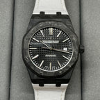 Audemars Piguet automatic watch with black textured dial and white strap