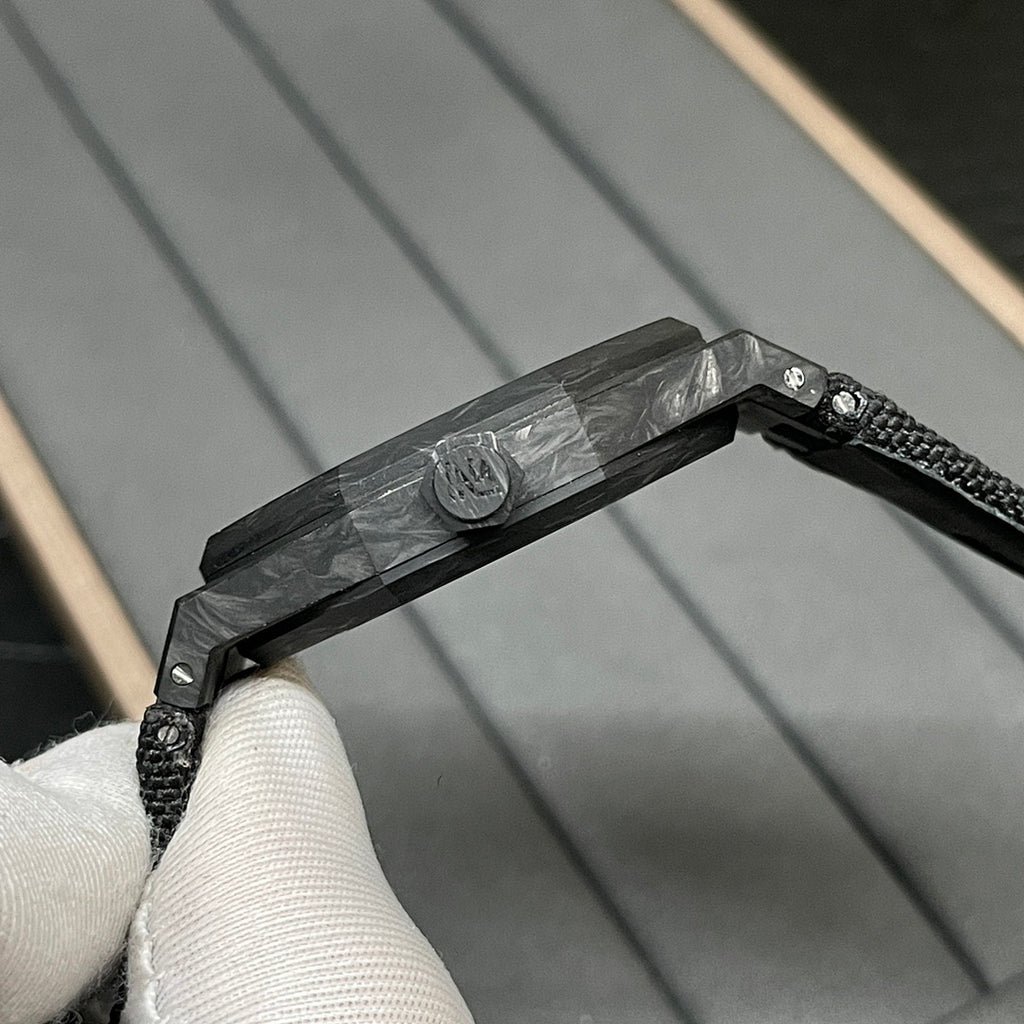 Audemars Piguet black watch side view with crown and textured strap