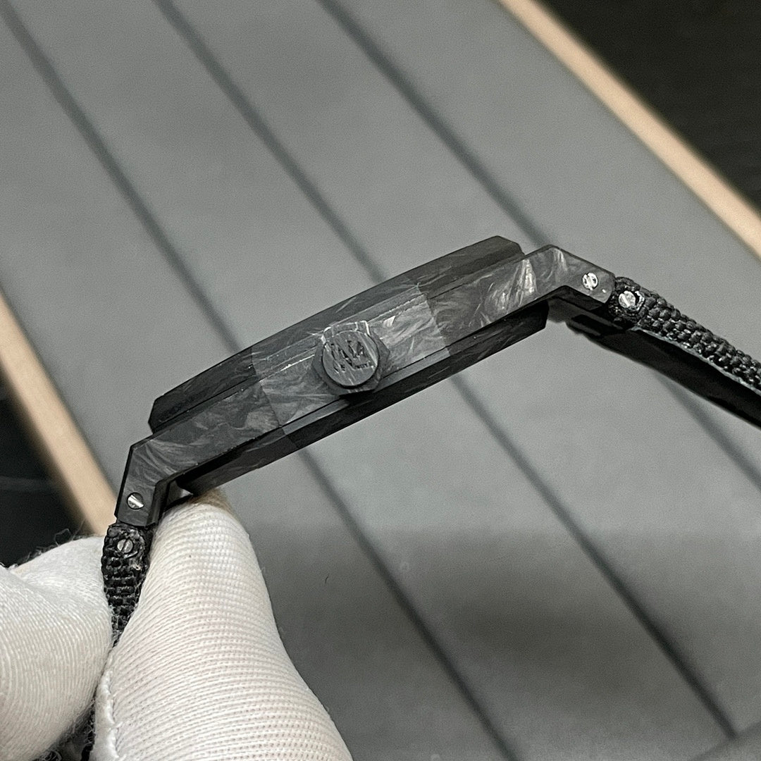 Audemars Piguet black watch side view with crown and textured strap