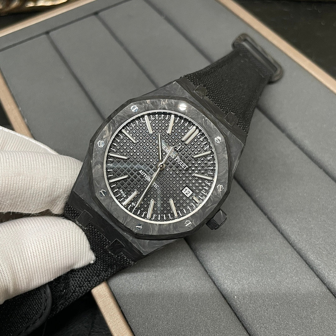 Audemars Piguet black dial sports watch with markers and date window