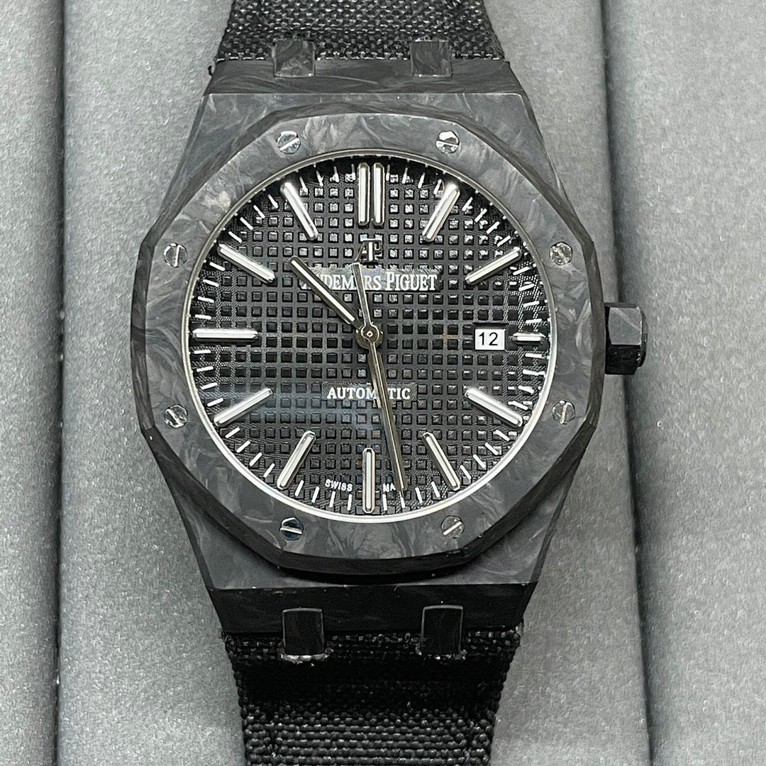 Audemars Piguet black sports watch with textured dial and date window